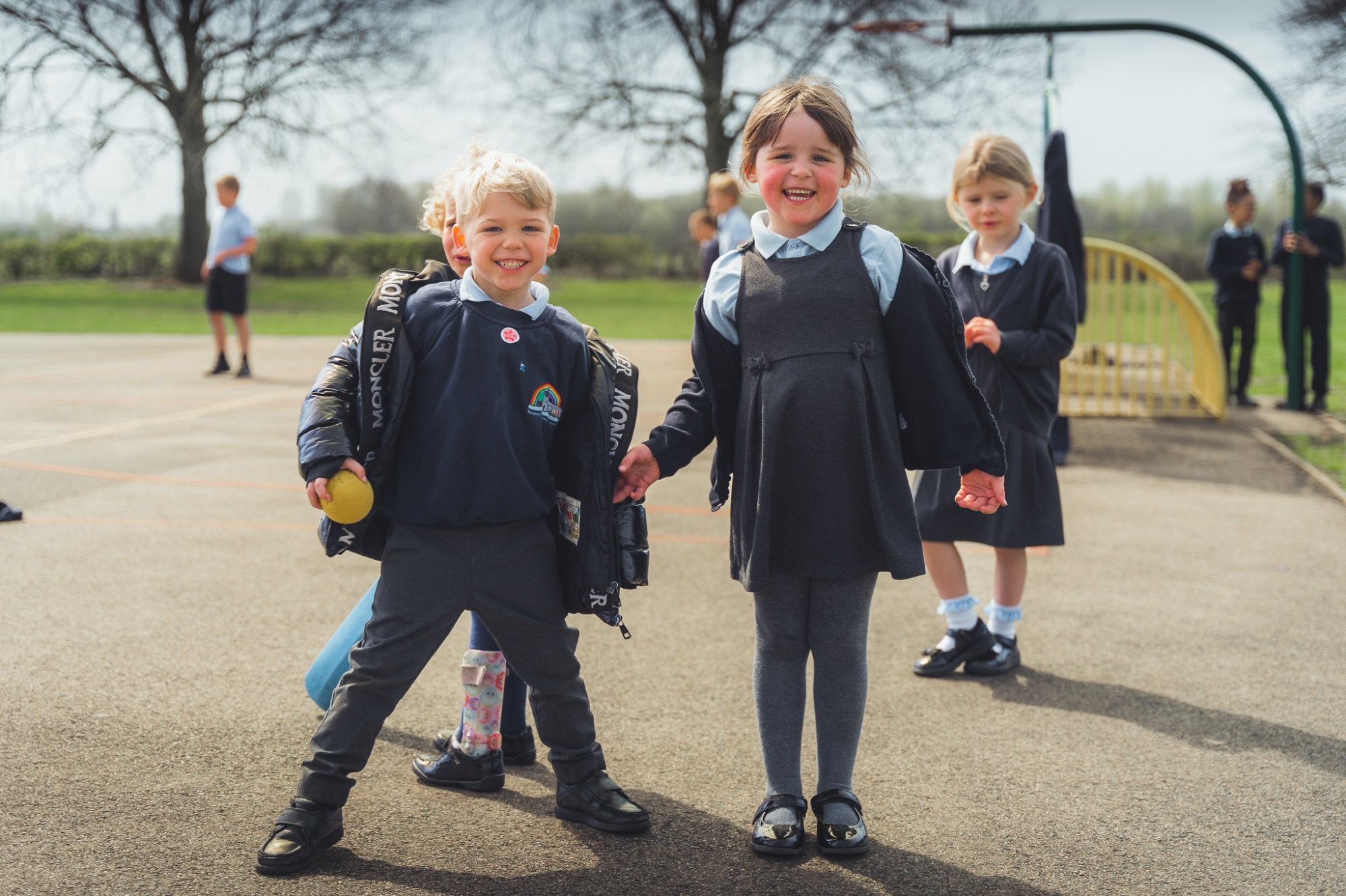 students smiling in the playground