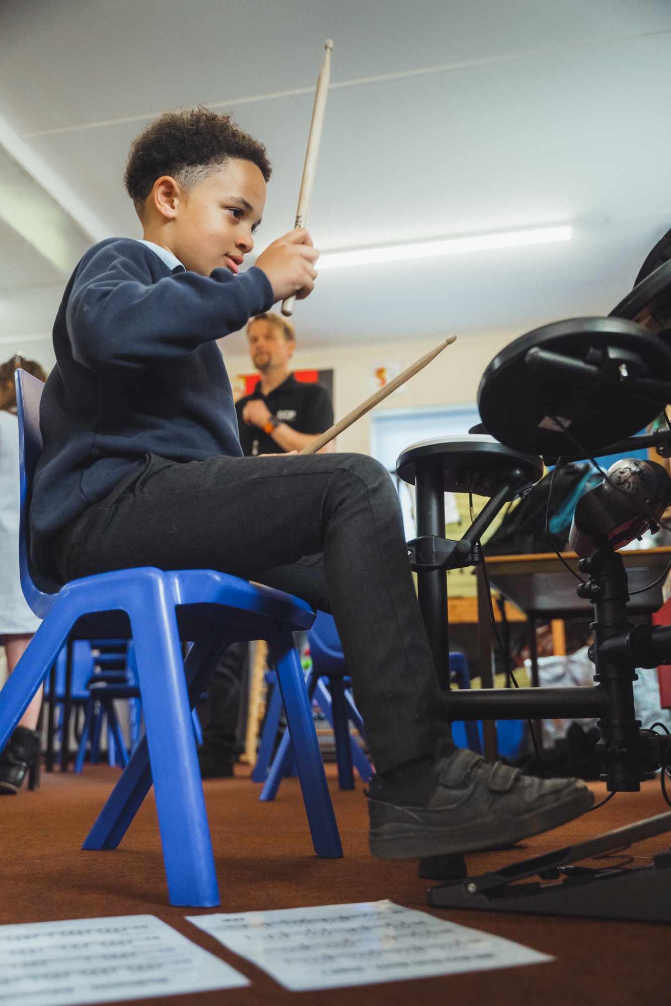 student in drum lesson