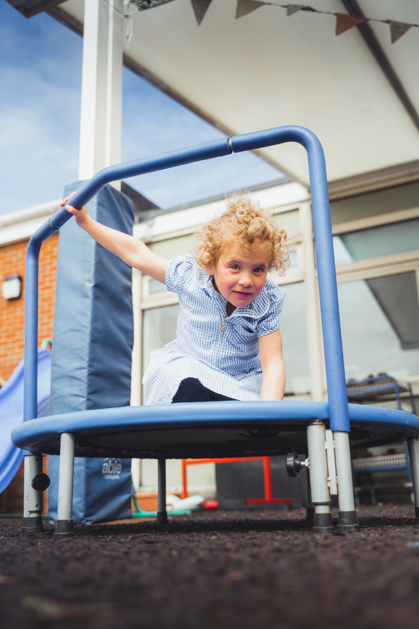 student on trampoline